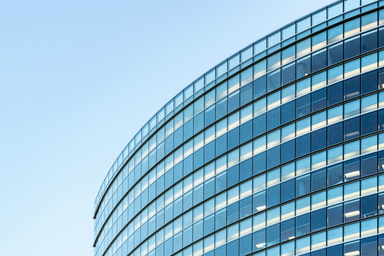Modern commercial building with blue glass facade