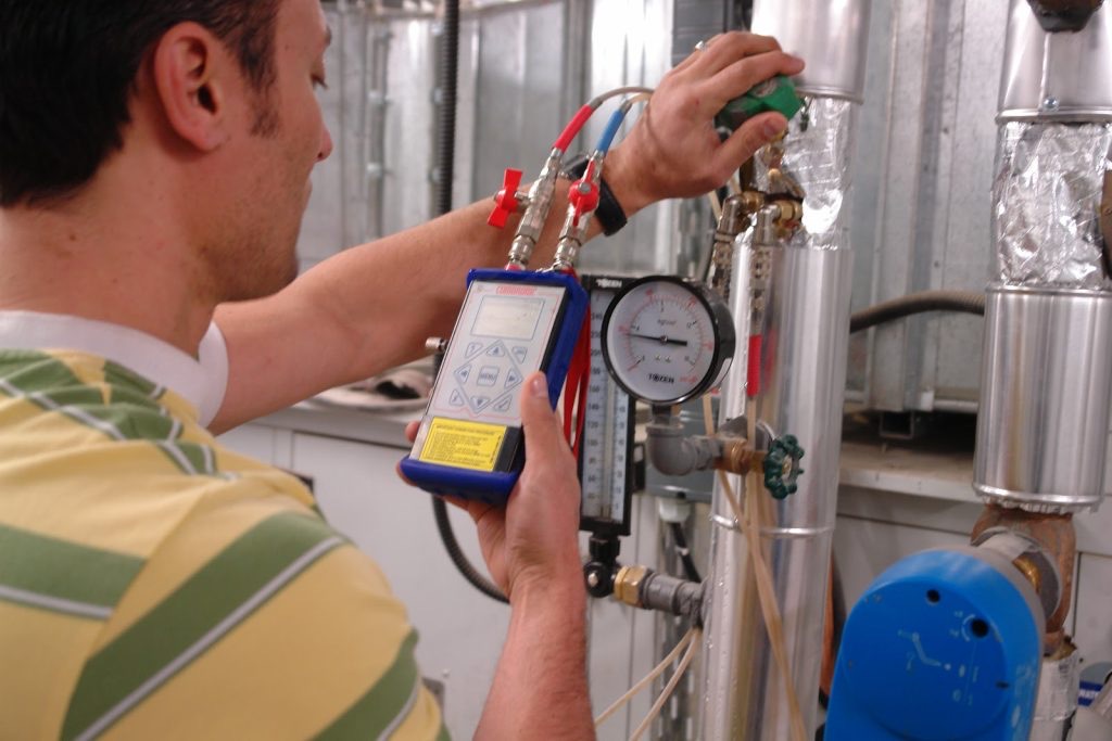 Hydronic balancing with a differential pressure meter